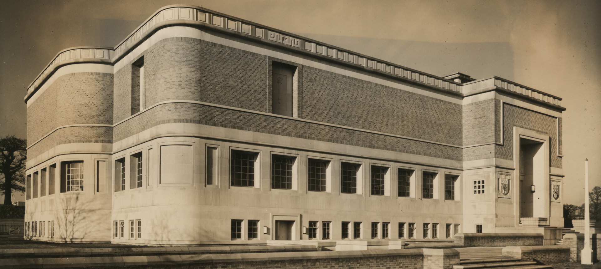 An old black and white photo of the Barber Institute, an Art Deco building.