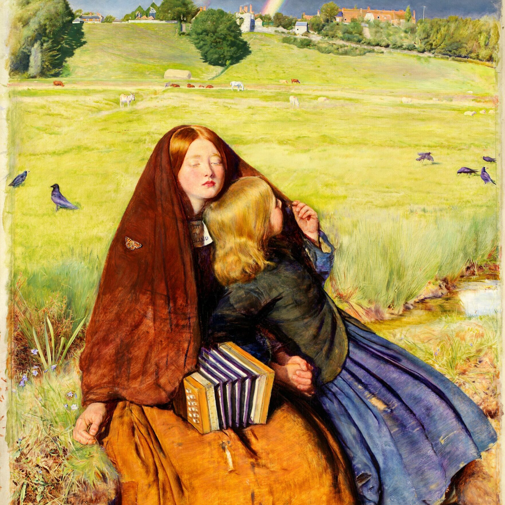 Two girls, in a meadow with a rainbow behind. One wears a 'pity the blind' sign.